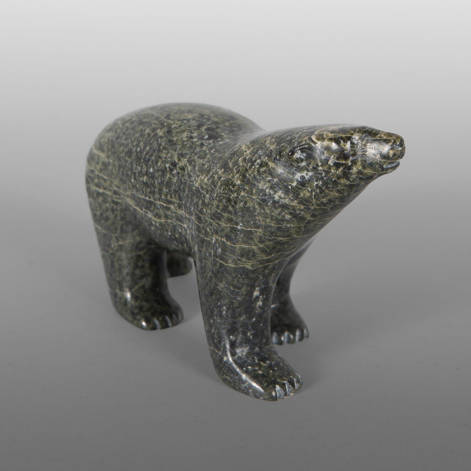 Walking Polar Bear
Johnny Sagiatuk
Inuit
Serpentine
5" x 3" x 2"
450