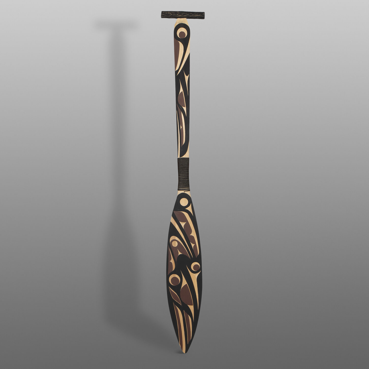 Blue Jay & Raven Paddle
Andy Peterson
Coast Salish
Yellow cedar, cord, paint
48" x 6" x 1"
1,600