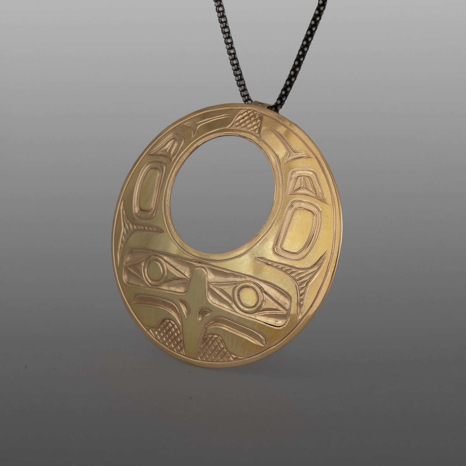 Eagle in Flight Pendant
William Bedard
Haida
14k gold
1¾" dia.
2,800