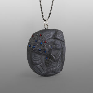 Berry Picking Woman Pendant
Melanie Russ
Haida
Argillite, glass
2⅛" x 1⅞" x ½"
375