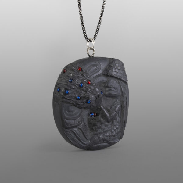 Berry Picking Woman Pendant
Melanie Russ
Haida
Argillite, glass
2⅛" x 1⅞" x ½"
375