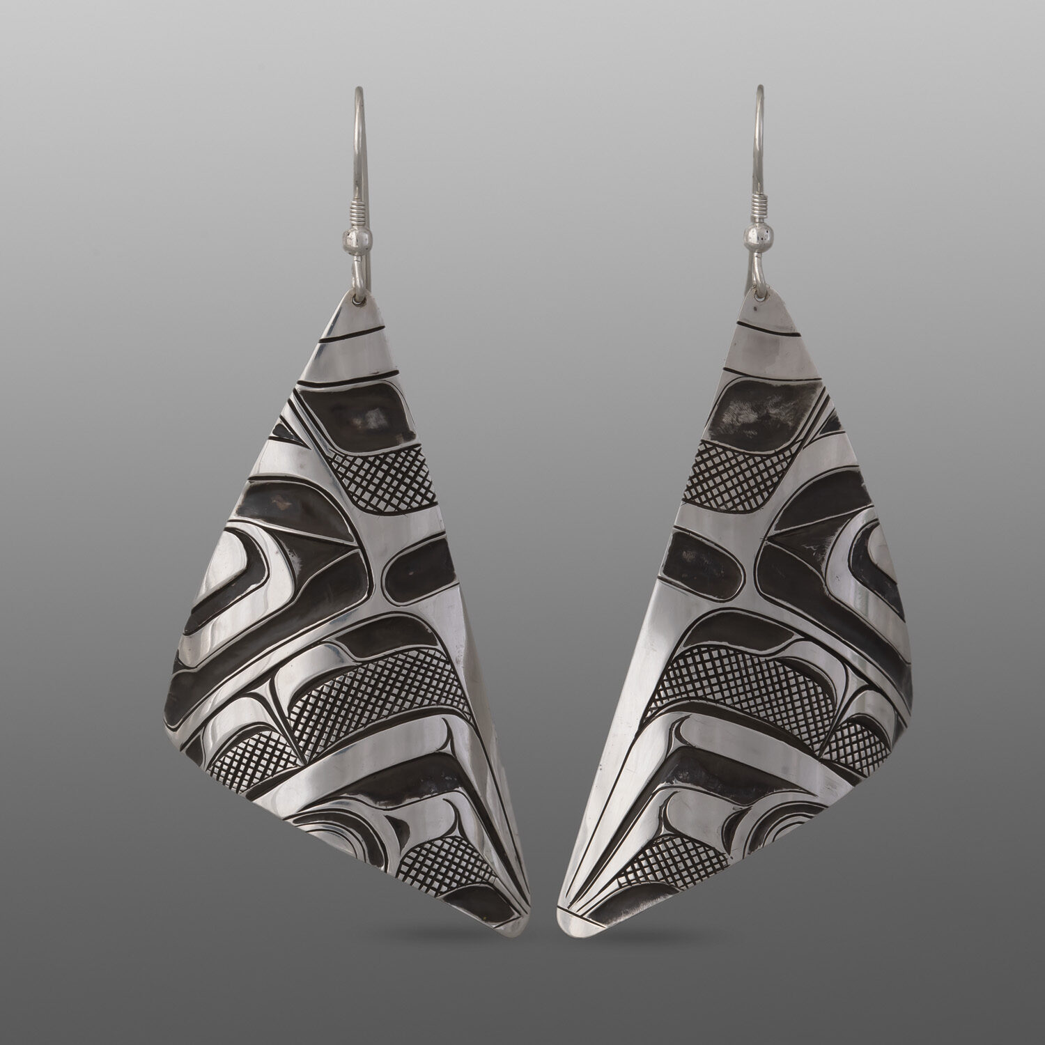 Raven Earrings
Corey Moraes
Tsimshian
Silver
2" x 1"
1,200