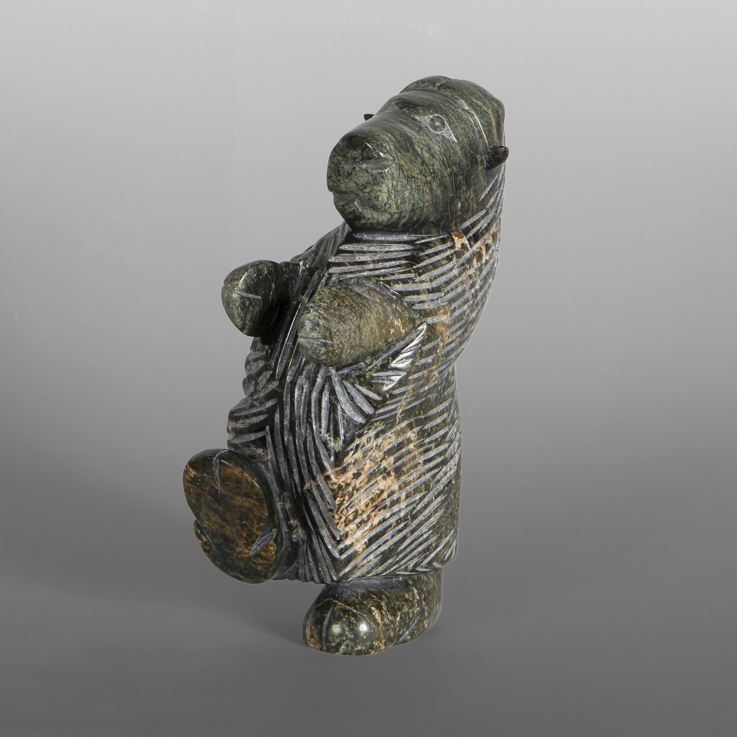 Dancing Musk Ox
Pitseolak Qimirpik
Inuit
Serpentine
9½" x 5½" x 3¾"
1,600