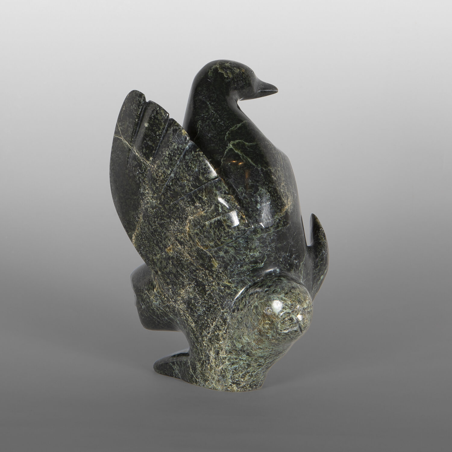 Sea, Land & Sky Transformation
Ningeosiaq Ashoona
Inuit
Serpentine
8¾" x 6¼" x 5"
$2,200